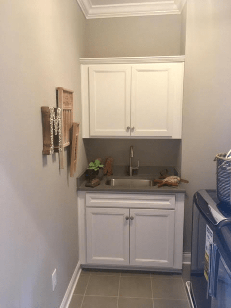 Washing room with grey painted walls